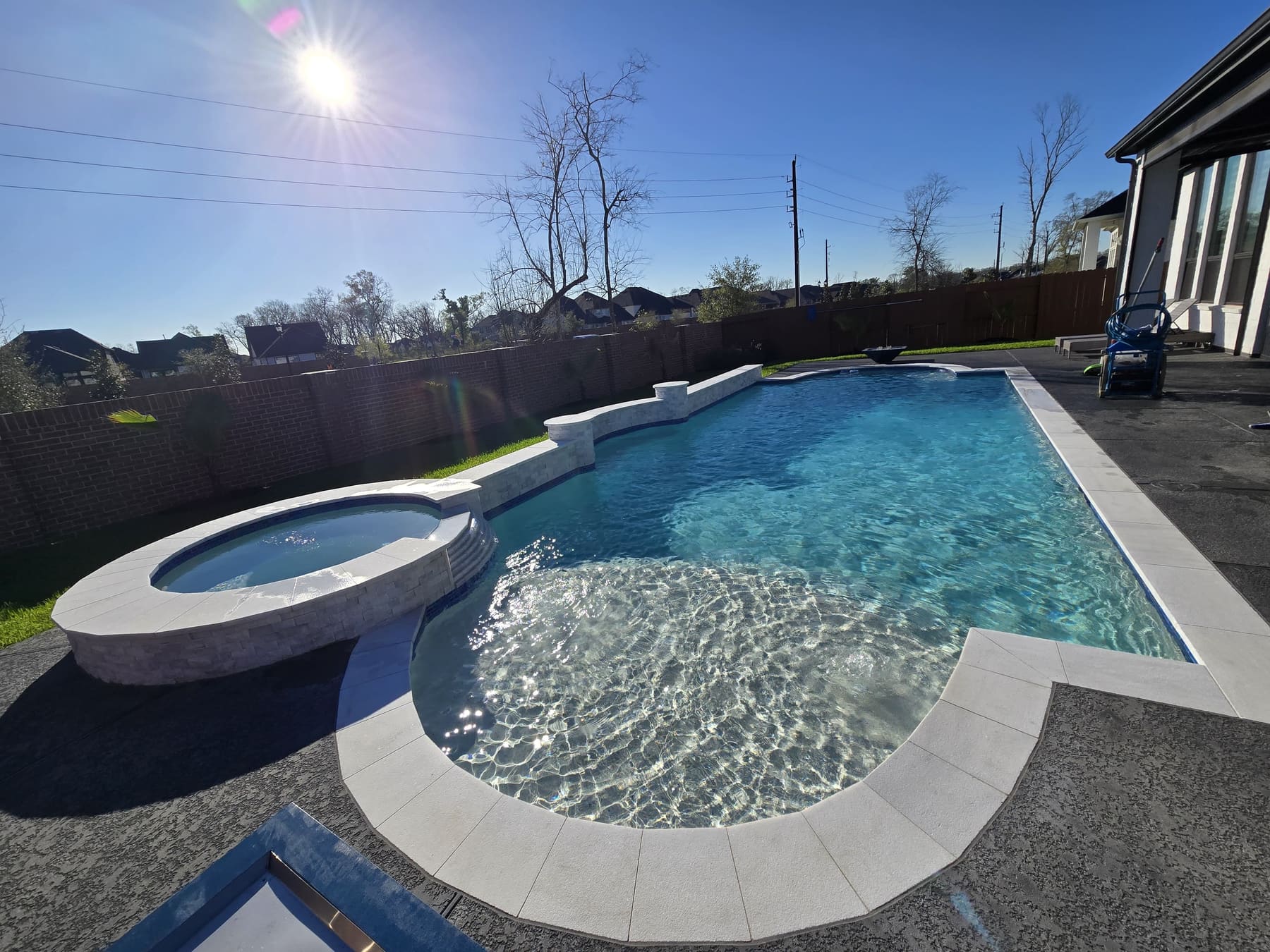 Freshly replastered pool and spa filled with clear water